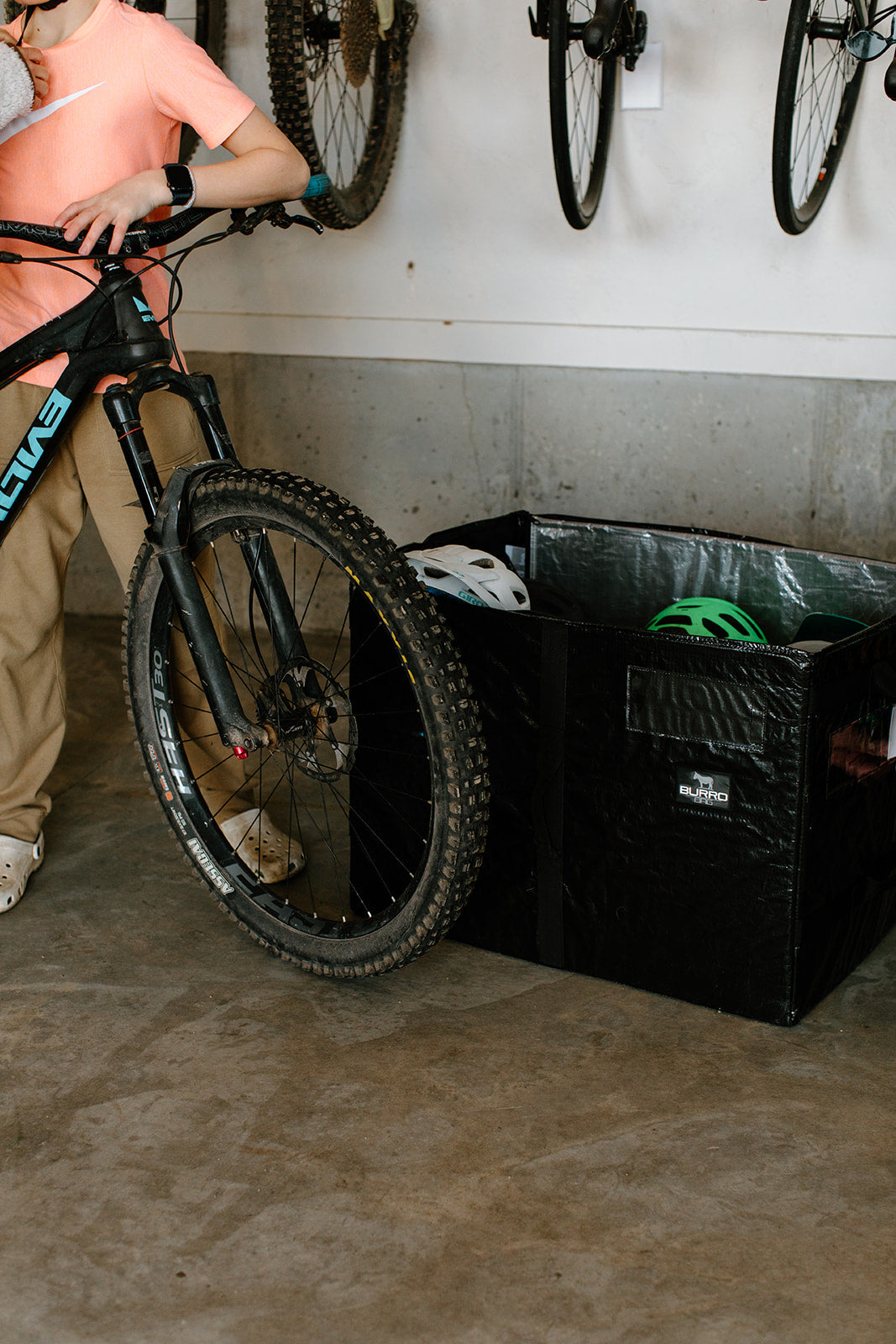 Burro Bag full of helmets and other mountain biking necessities