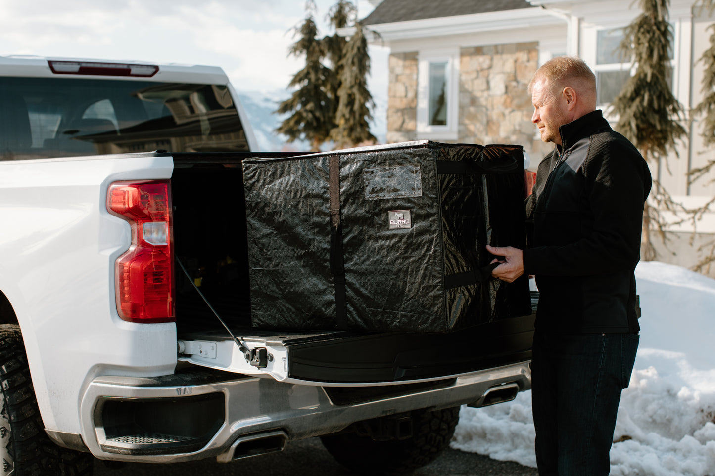 Burro Bag loaded with camping gear in truck bed